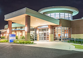 The Affinity Walk-In Clinic building exterior at night